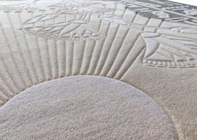 Carved sun design on dual-texture Egyptian style rug