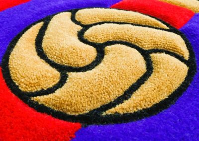 Close-up of the FC Barcelona rug with the vintage football element