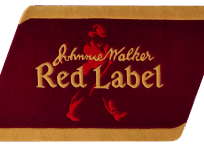 op view of Johnie Walker Red Label hand-tufted rug made of British wool