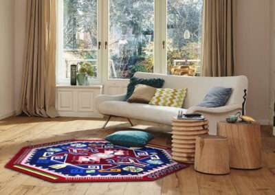 Boho chic rug with geometric pattern, side angle view
