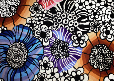 Bold colours of hand-tufted abstract floral rug