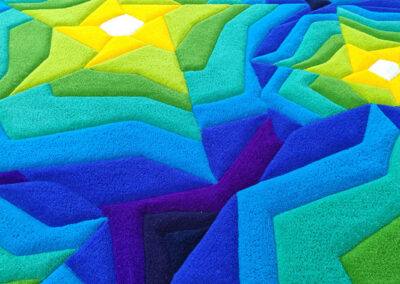 Pile detail of colorful rug — British wool texture