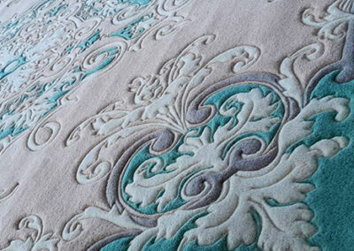 Close-up of sculpted pile detail – artisanal hand-tufted carpet design.