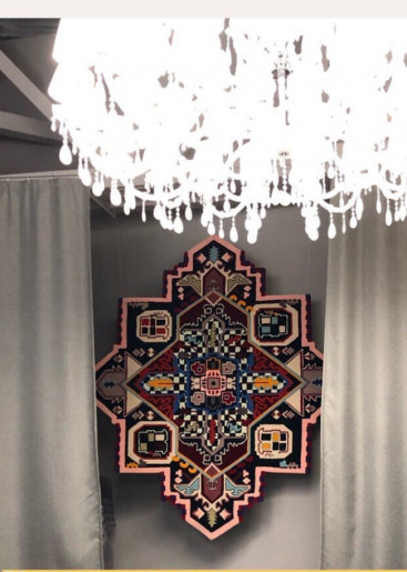 Artistic rug in boho style with asymmetrical colors - real photo