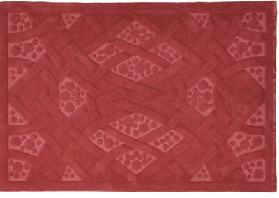 3D sculpted Celtic rug in terracotta made from British wool