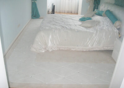 Custom bedroom rug with Swarovski crystals, fitted to room layout and color scheme