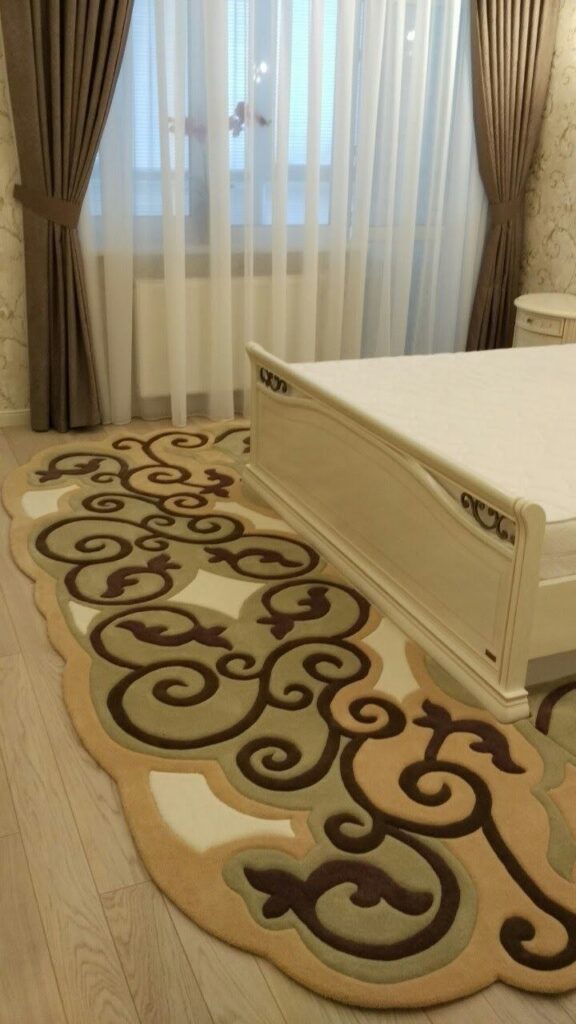 "Bedroom interior featuring wrought iron inspired rug"