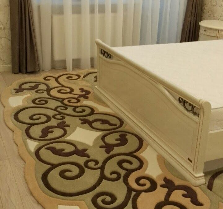 "Bedroom interior featuring wrought iron inspired rug"