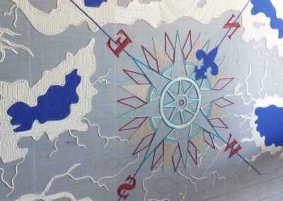 Design composition of children’s nautical rug with compass motif