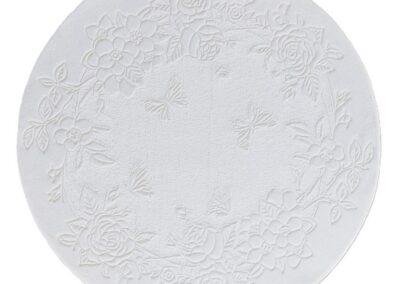 Round white carpet with two textures and relief floral pattern
