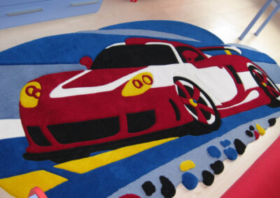 Handmade supercar rug placed in a modern kid's room