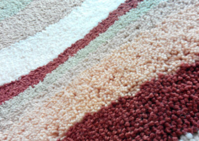 High pile texture of shaggy striped rug – close-up
