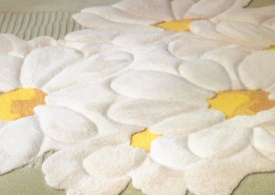 Relief rug daisies with bouclé background