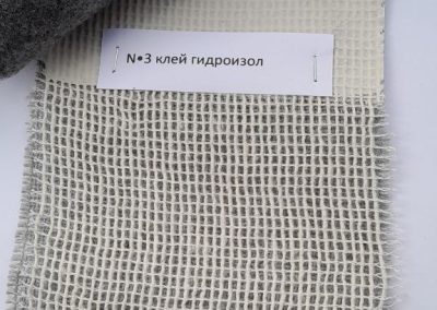 Cotton reinforcing mesh for tufted rugs